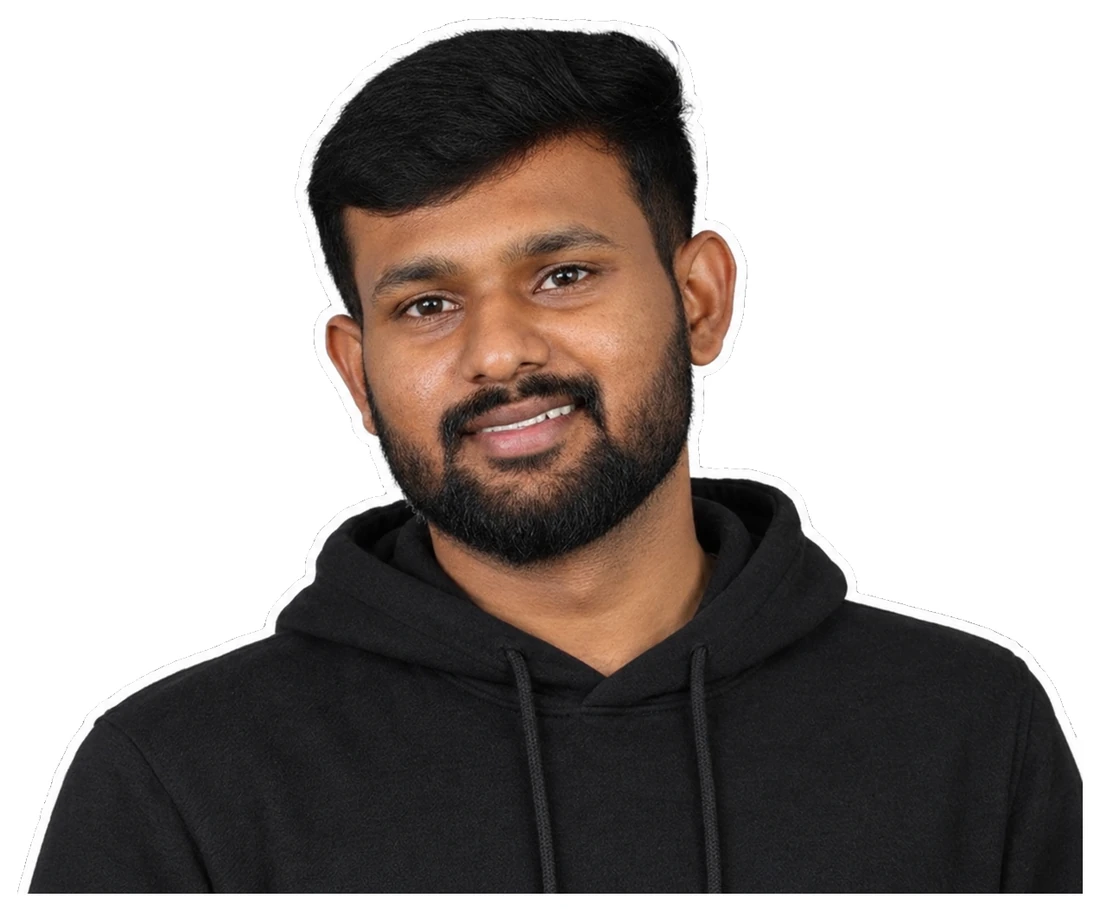Sakthi Vignesh smiling in a black hoodie